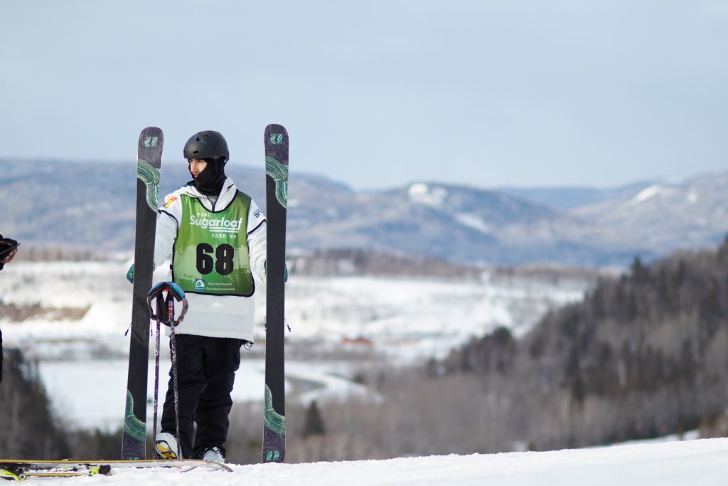 freeski racer at the Adrenaline SnowFest at Sugarloaf Snow Park with a view on the Appalachian mountains
